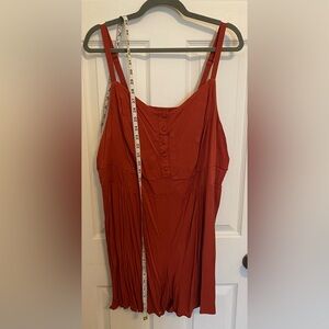 Burnt orange romper with button and eyelet embroidered detail